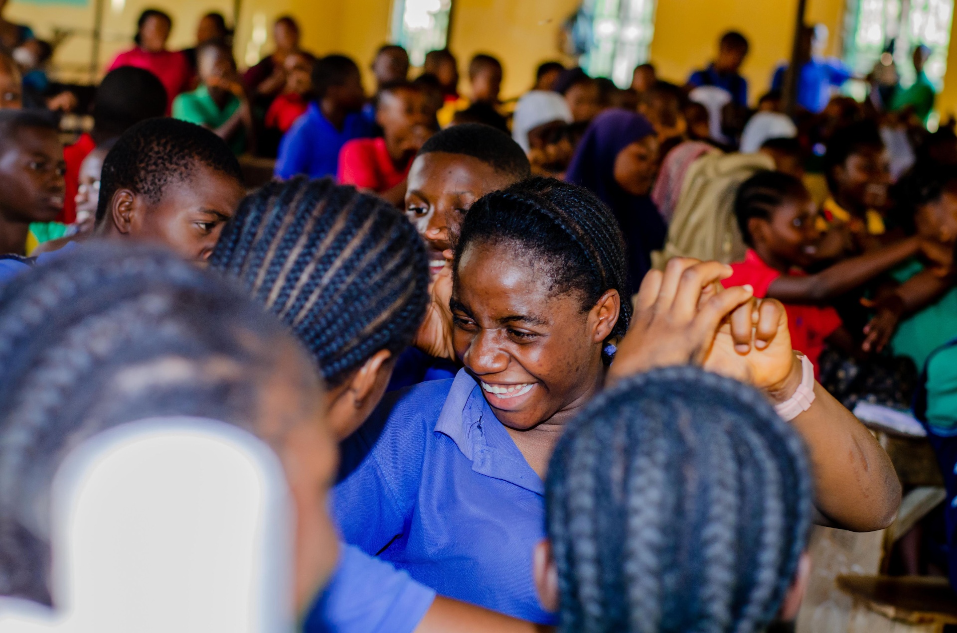 A FAE mentor speaking with a young person